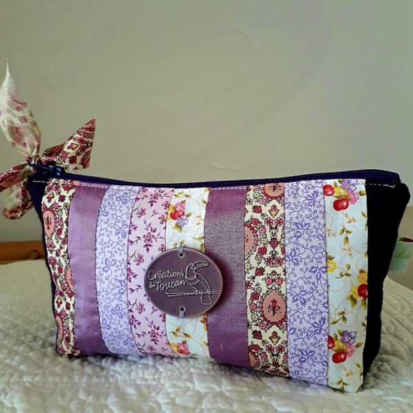 Pochette toucan prune